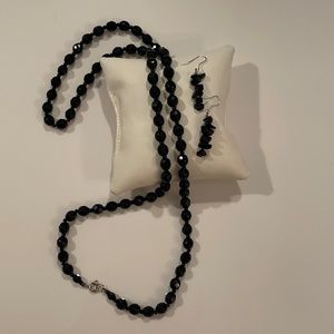 Black beaded necklace with earrings.